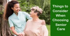 Factors to Consider When Choosing Senior Care. Picture of a young black female home health aide, taking a walk outside with an older caucasian female.