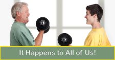 It Happens to All of Us! Picture of an older caucasian male and a young caucasian male lifting light barbell weights together.
